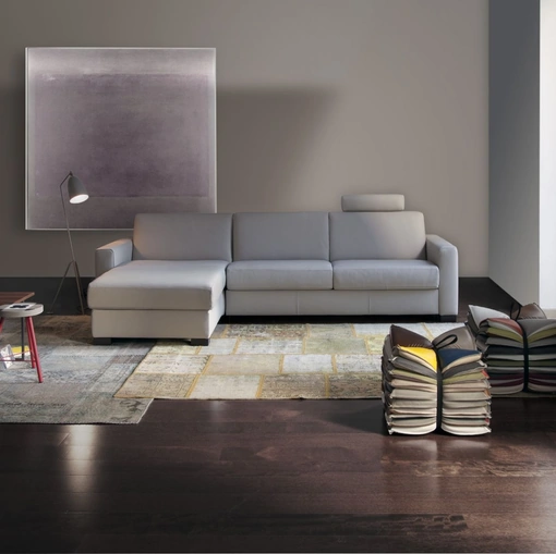 Divano Letto in tessuto con penisola contenitore Madonna di Calia