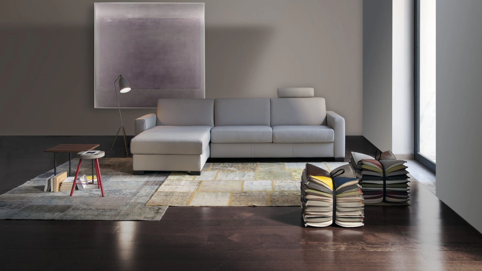 Divano Letto in tessuto con penisola contenitore Madonna di Calia