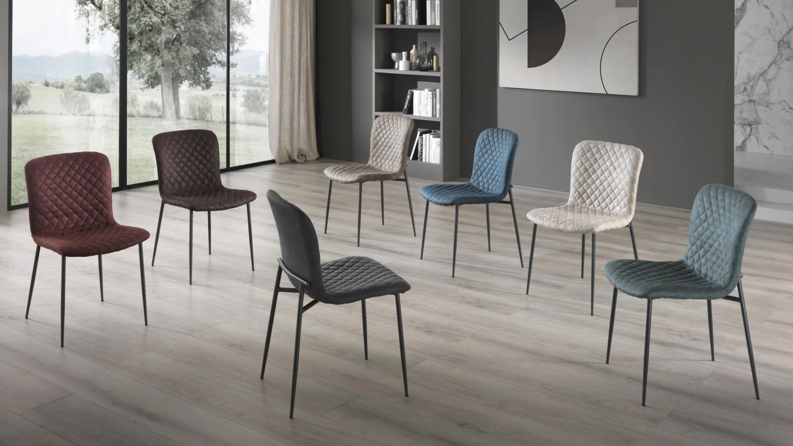 Sedia Gemma rivestita in microfibra trapuntata con struttura in acciaio di Gipi Le Sedie