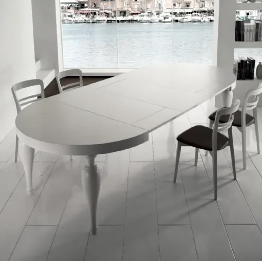 Tavolo rotondo allungabile Bridge in legno con gambe in massello di Gipi Le Sedie