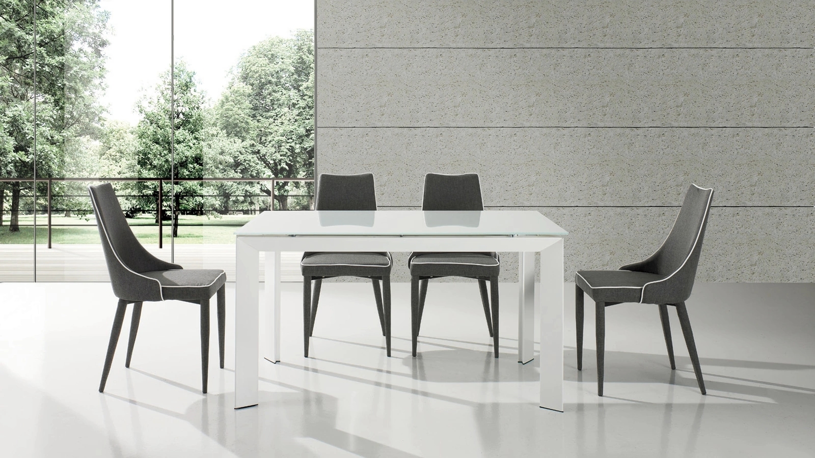 Tavolo allungabile Carlos in vetro e acciaio di Gipi Le Sedie